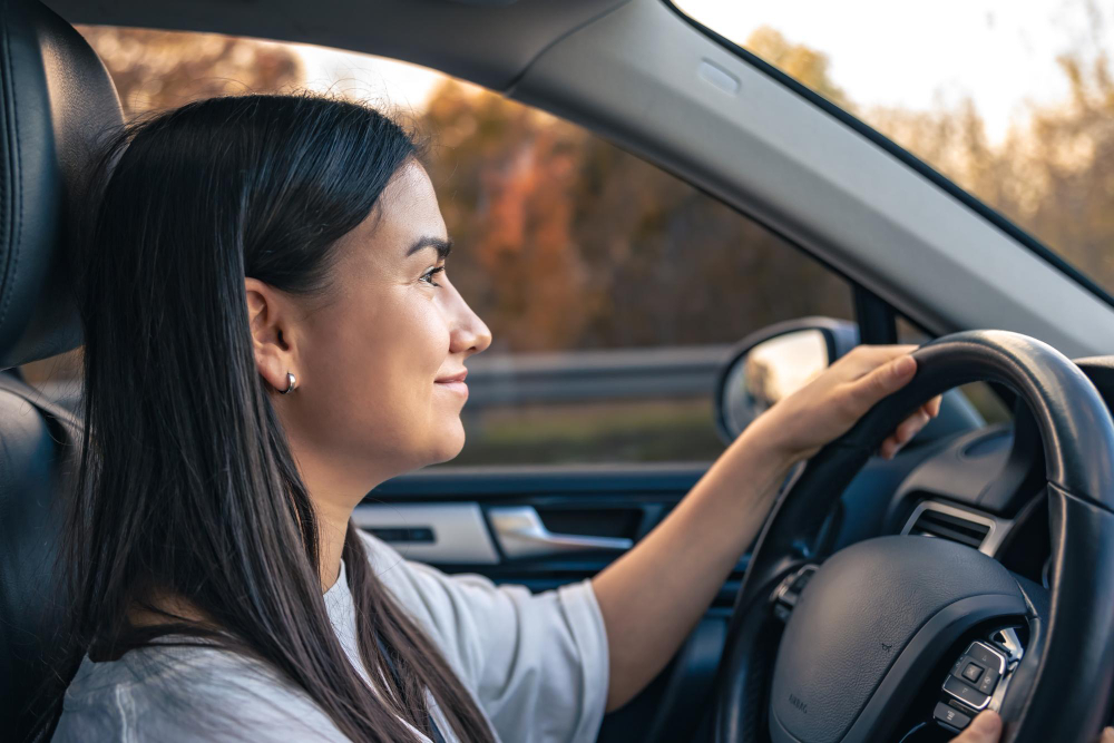 woman happy driving